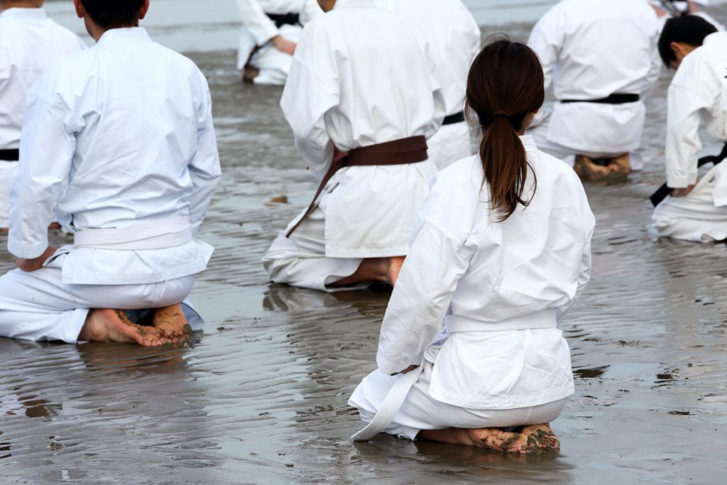 Karate students practising focus and discipline in the dojo